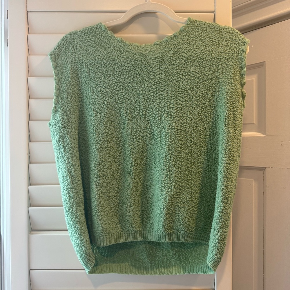 green knit top
